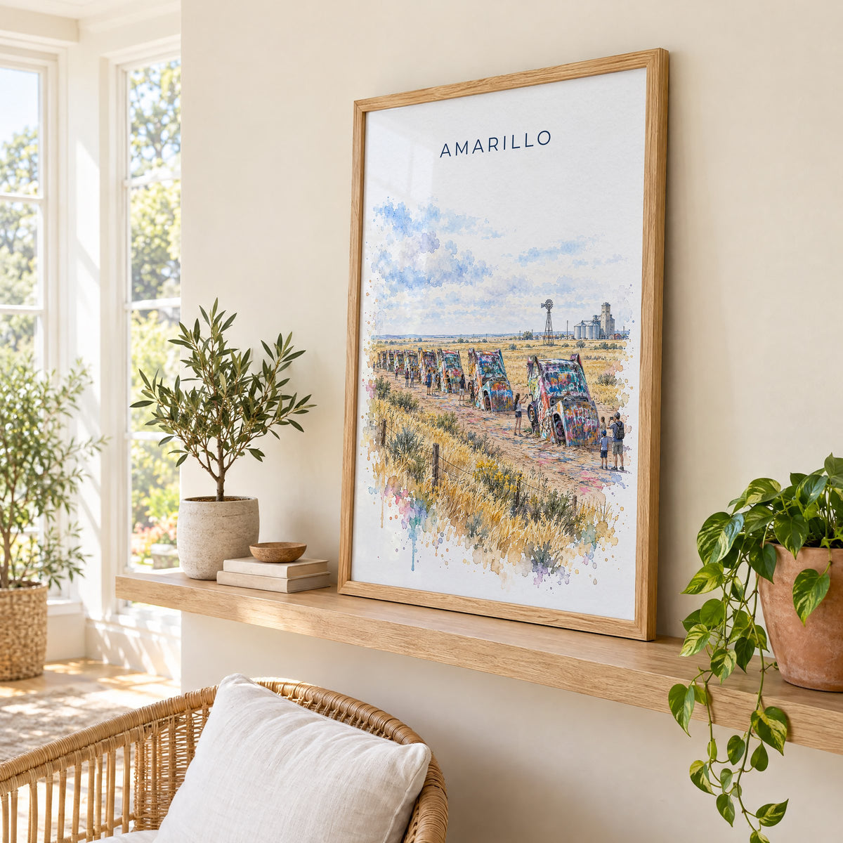 Amarillo watercolor print in an oak frame on a picture ledge in a sunlit sunroom