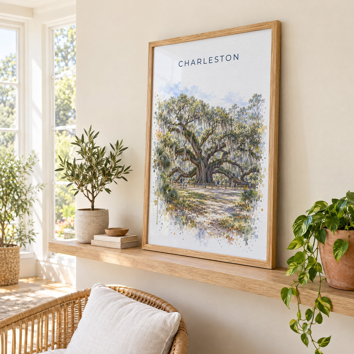 Angel Oak Charleston watercolor print in an oak frame on a picture ledge in a sunlit sunroom