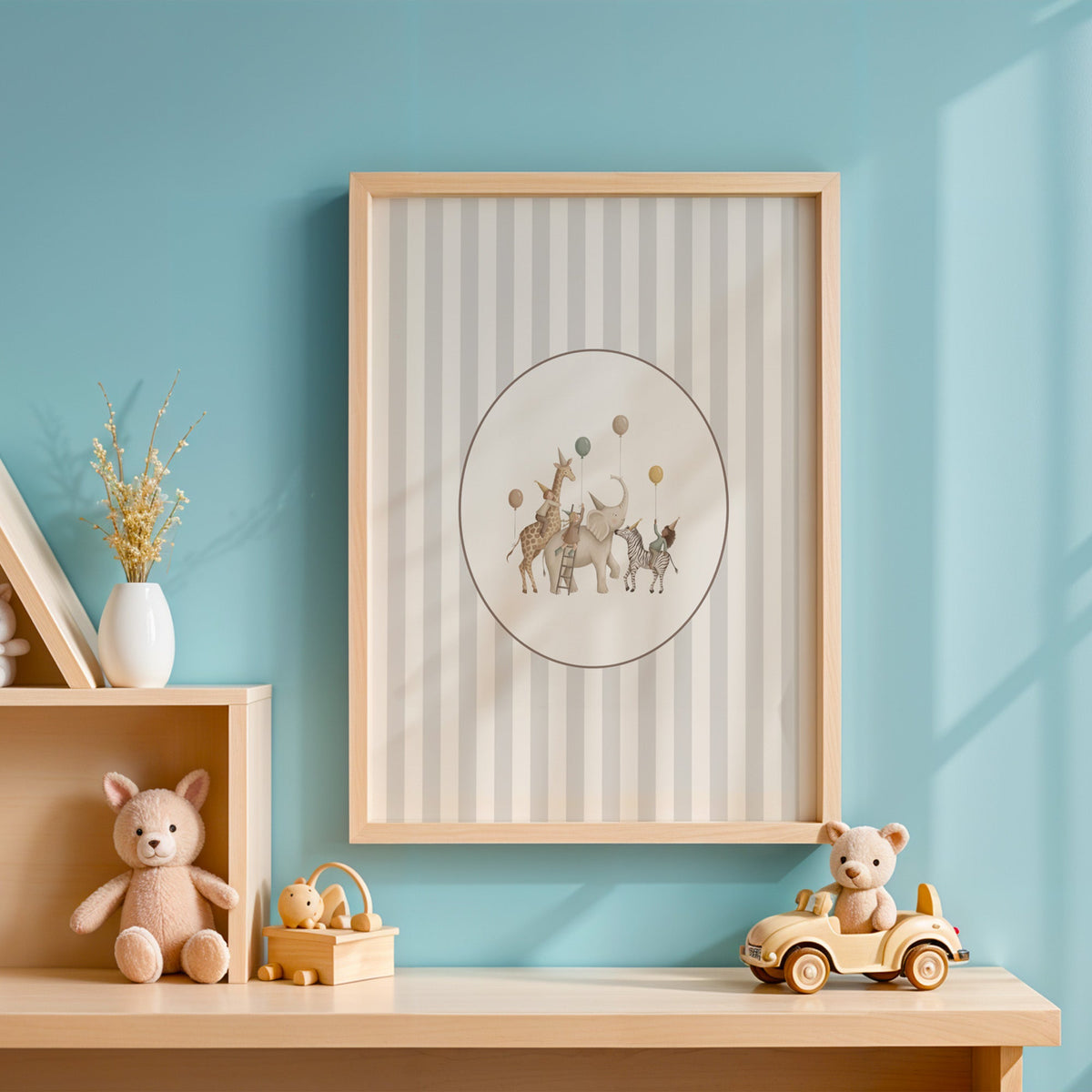 Animal birthday parade in an oval on stripes nursery print in an oak frame on a blue wall above a shelf of wooden toys