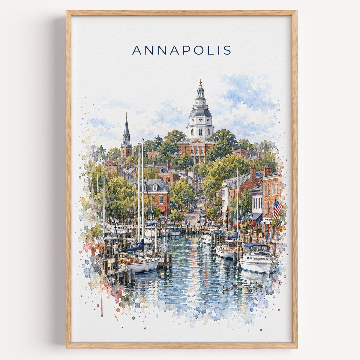 Annapolis watercolor print in a light oak frame on a plain white wall