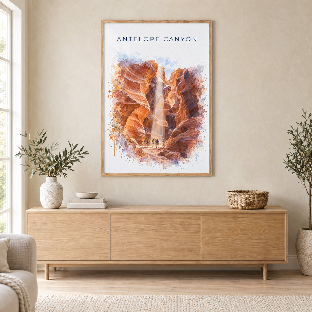 Antelope Canyon watercolor print in an oak frame above a light wood sideboard in a Scandinavian living room