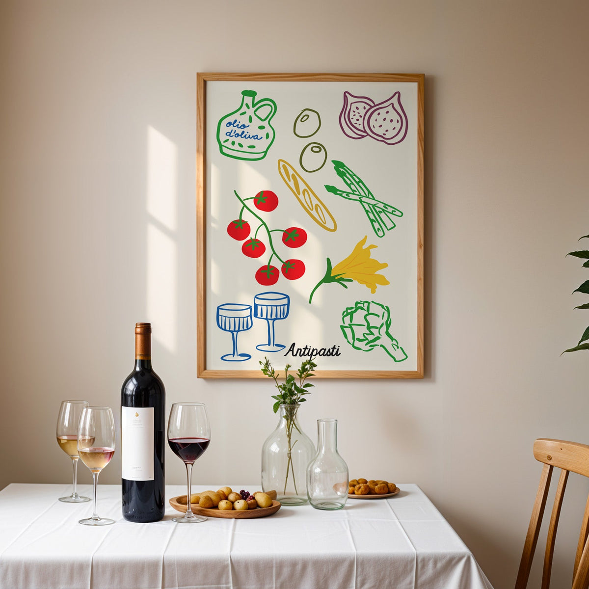 Antipasti line art print in an oak frame above a table laid with red wine and glasses