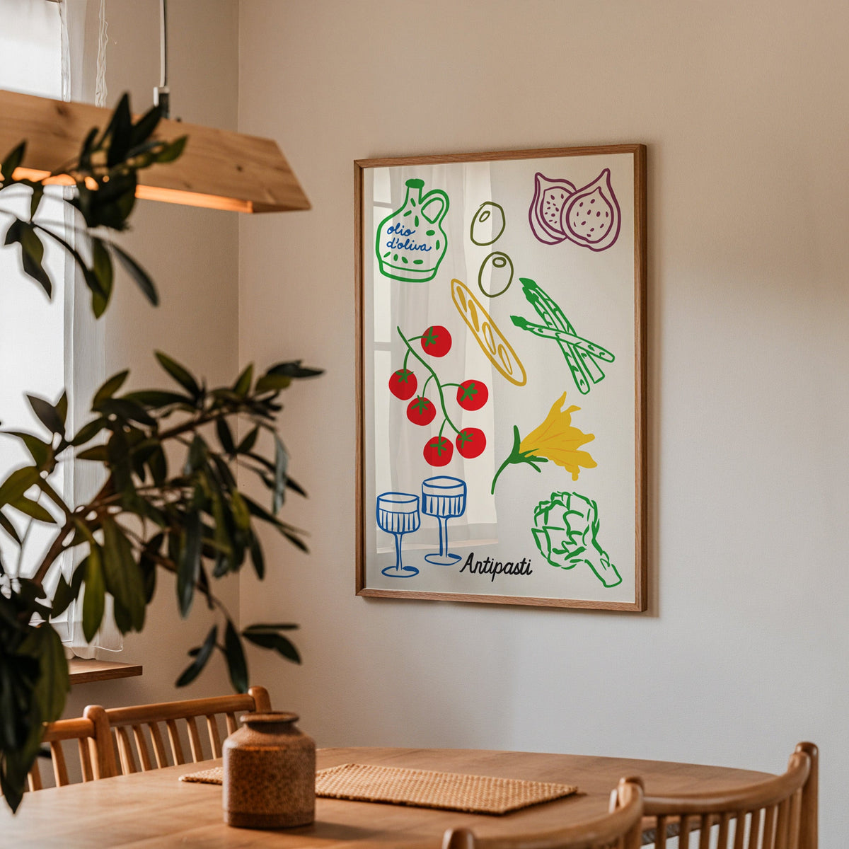 Antipasti line art print in a walnut frame above a dining table beside an olive tree