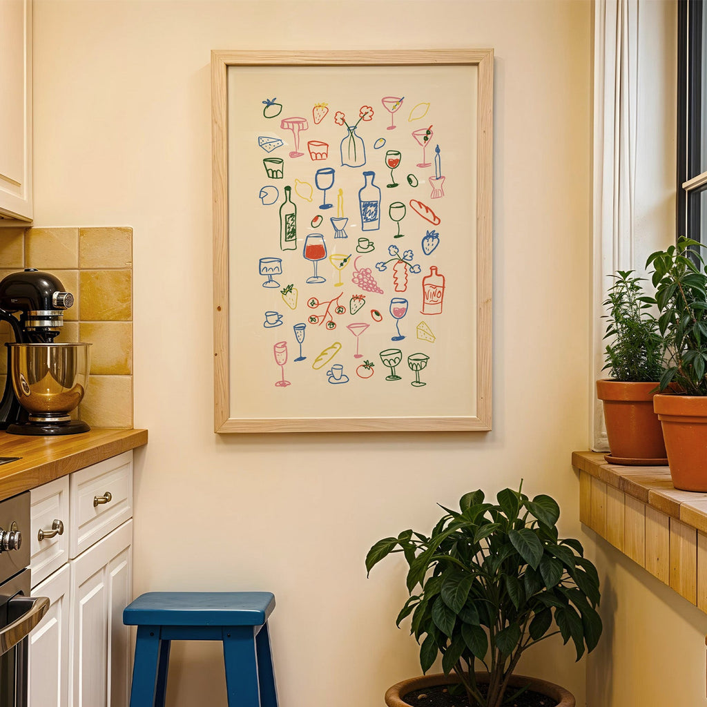 Aperitivo doodle print in a wood frame on a yellow tiled kitchen wall