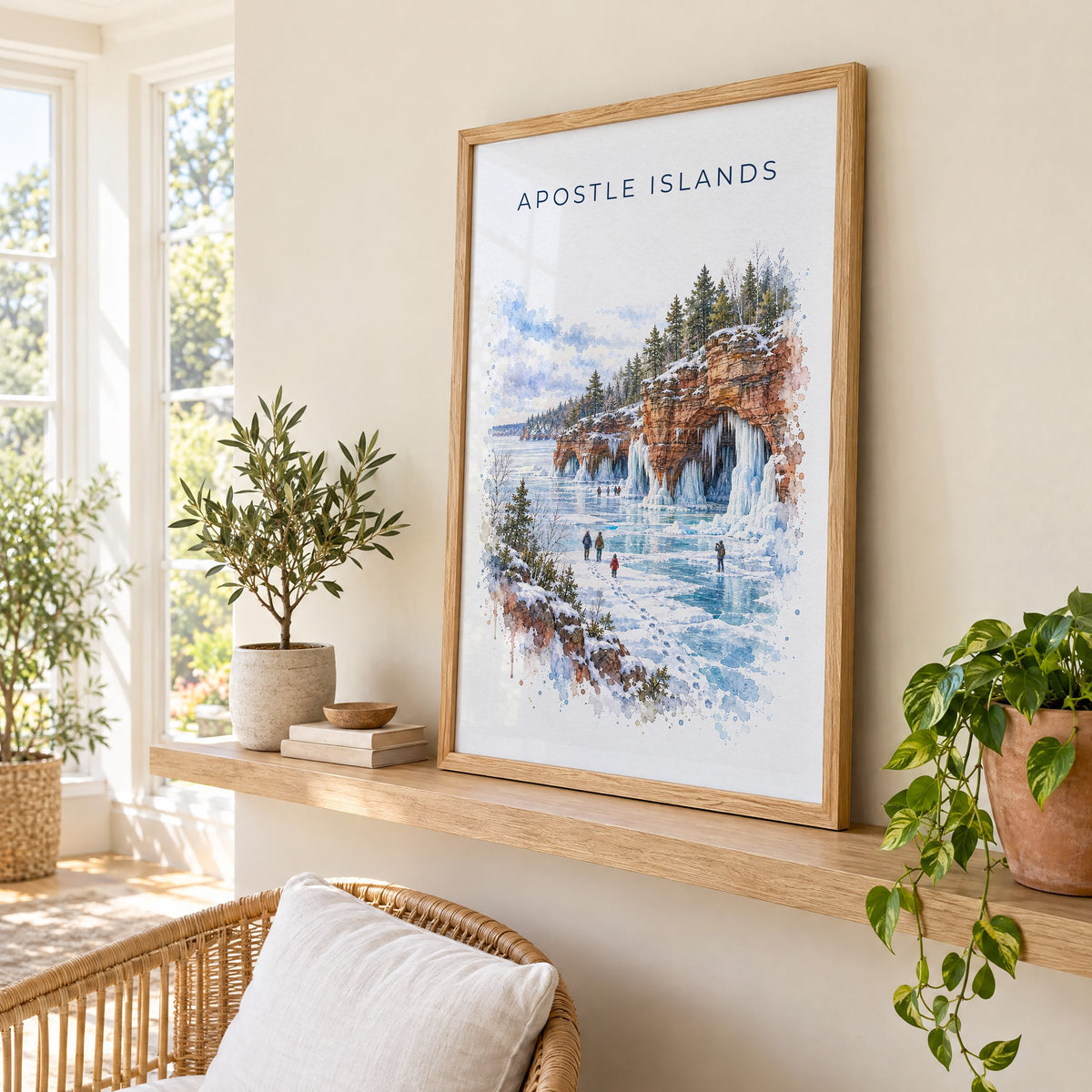 Apostle Islands watercolor print in an oak frame on a picture ledge in a sunlit sunroom