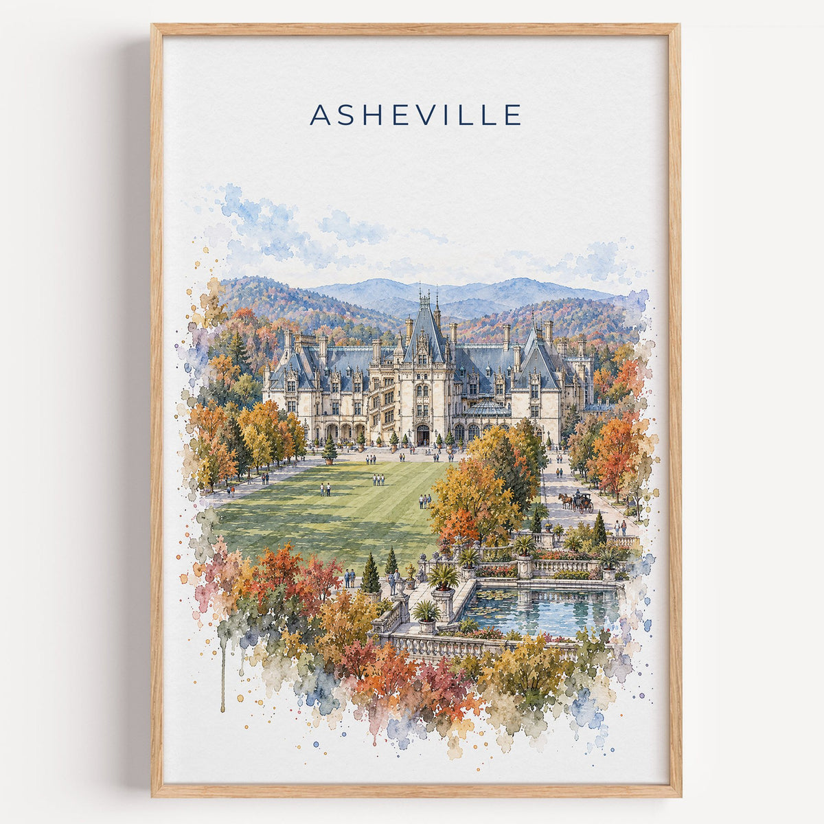 Asheville watercolor print in a light oak frame on a plain white wall