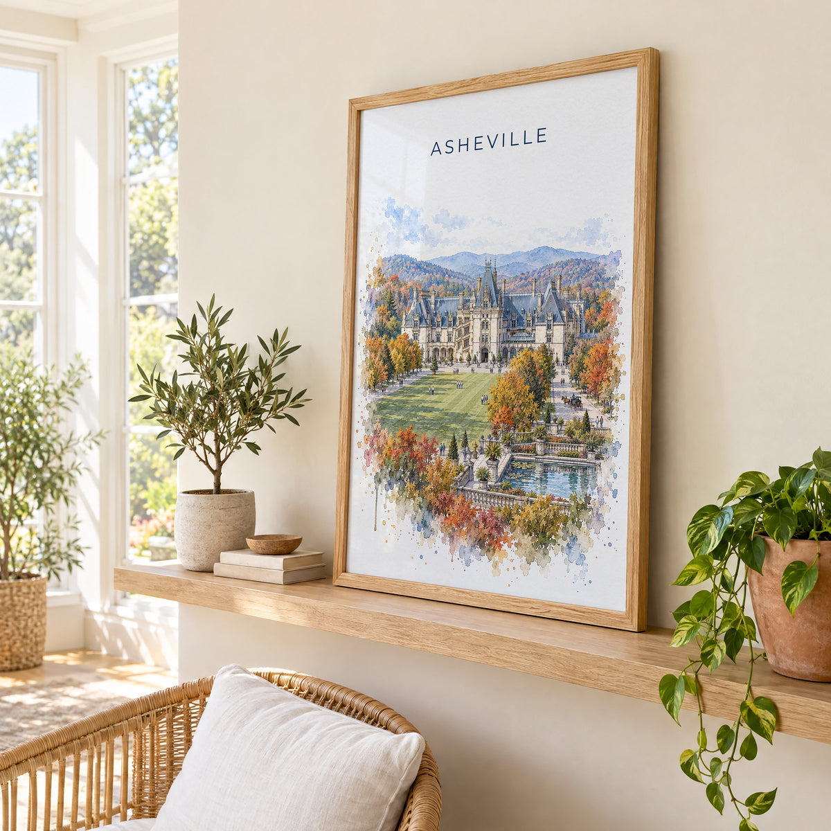 Asheville watercolor print in an oak frame on a picture ledge in a sunlit sunroom