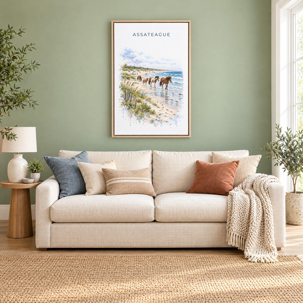 Assateague Island National Seashore watercolor as a natural floater canvas above a cream linen sofa on a sage green wall