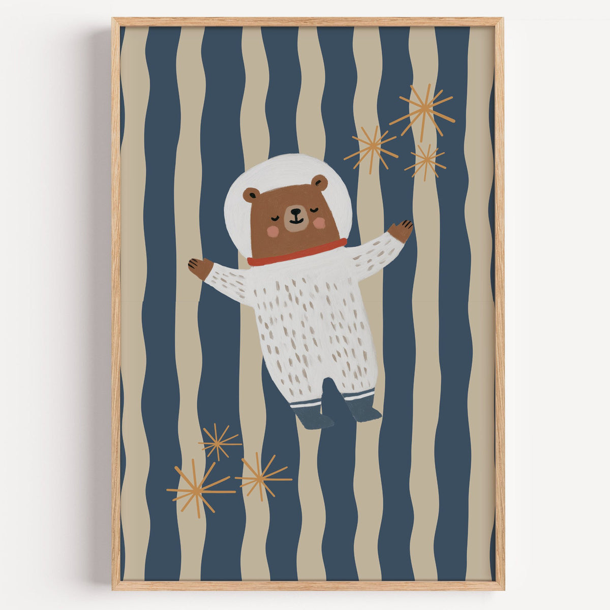 Astronaut bear wavy stripe nursery print in a light oak frame on a plain white wall