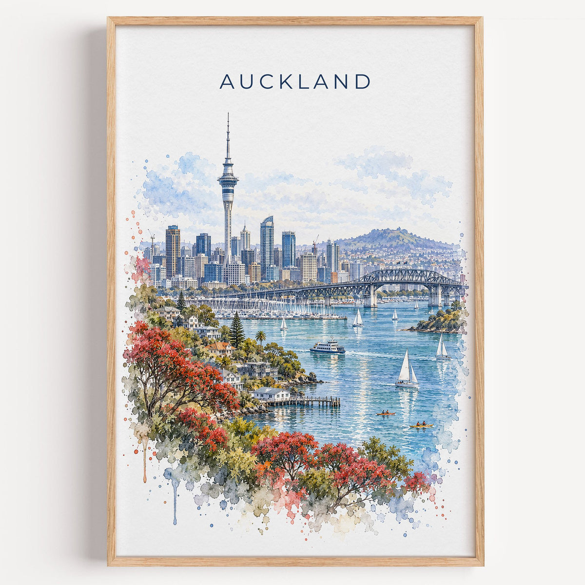 Auckland watercolor print in a light oak frame on a plain white wall