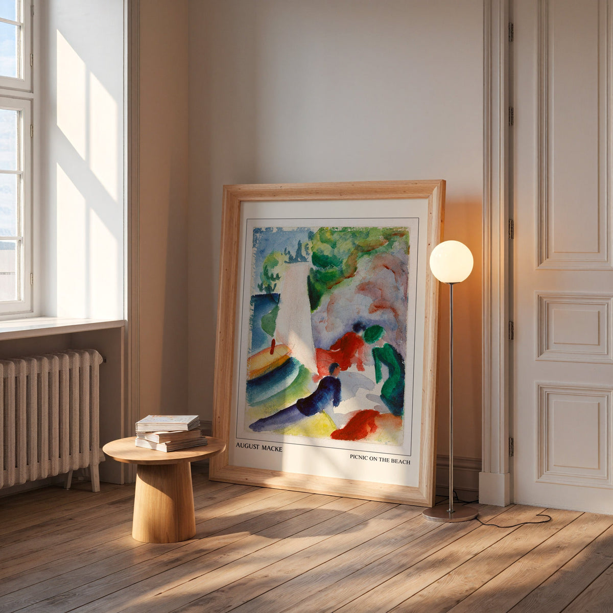 Macke watercolour in a wide pine frame leaning by a sunlit window
