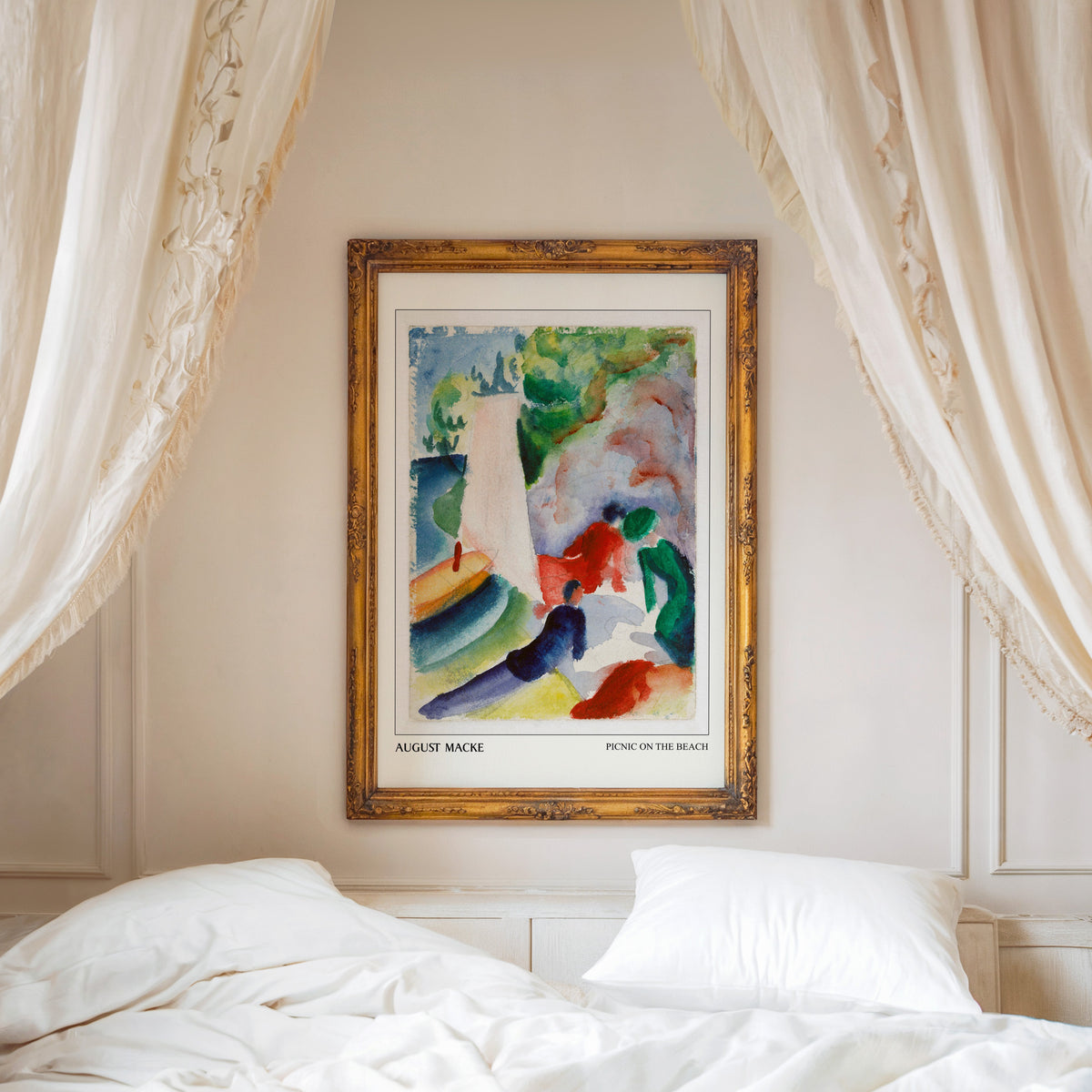 Picnic on the Beach print shown in an ornate gold frame above a canopy bed