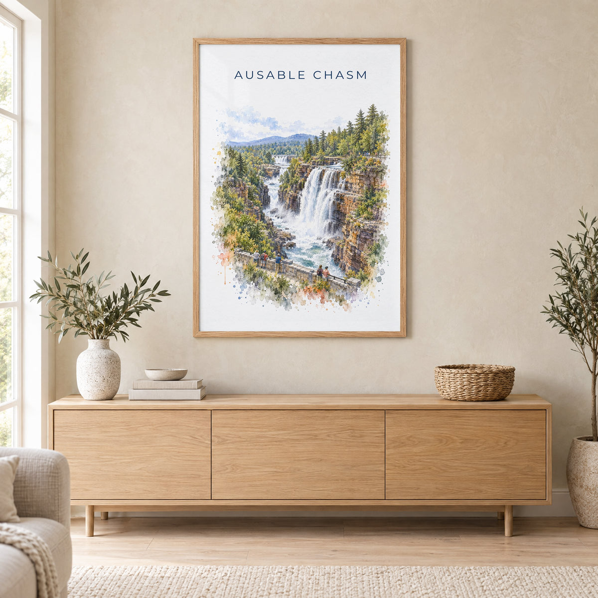 Ausable Chasm watercolor print in an oak frame above a light wood sideboard in a Scandinavian living room