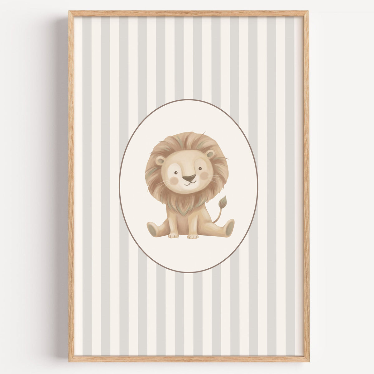 Baby lion in oval on grey stripes nursery print in a light oak frame on a plain white wall