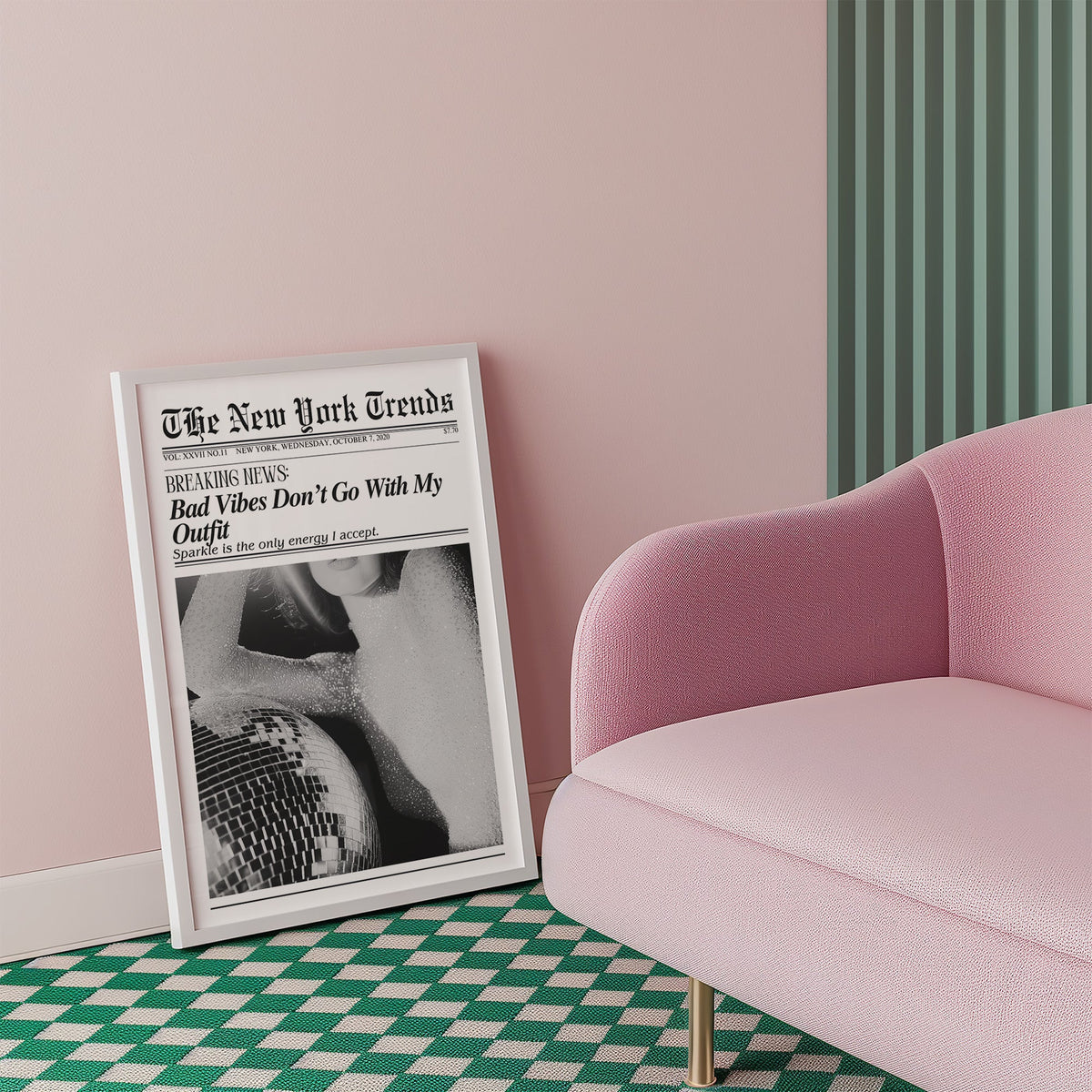 Sequin top and disco ball mock newspaper print in a white frame beside a pink armchair on a checkered floor
