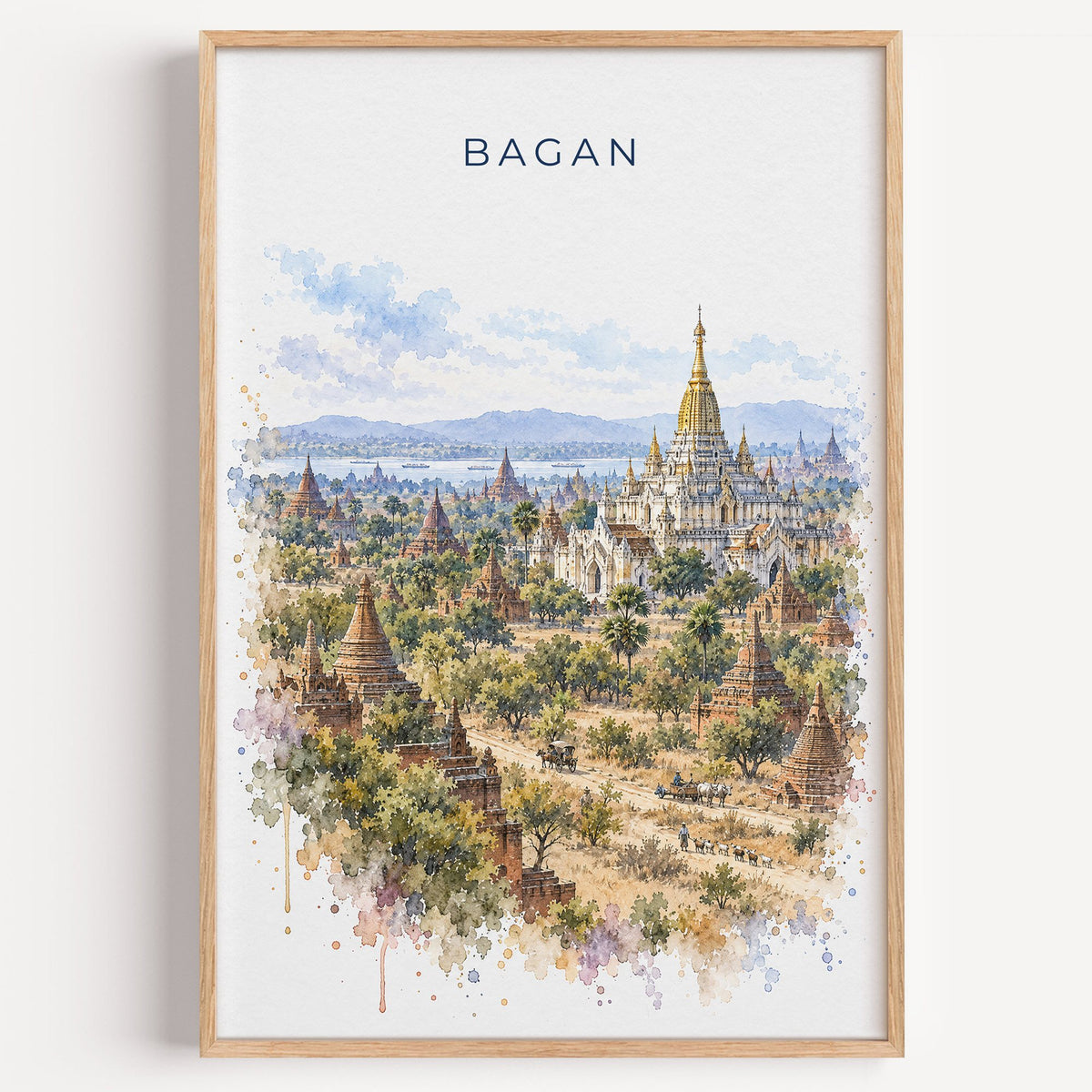 Bagan watercolor print in a light oak frame on a plain white wall