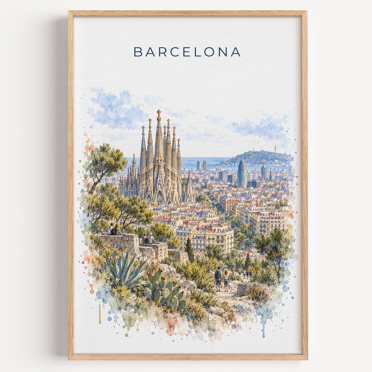 Barcelona watercolor print in a light oak frame on a plain white wall