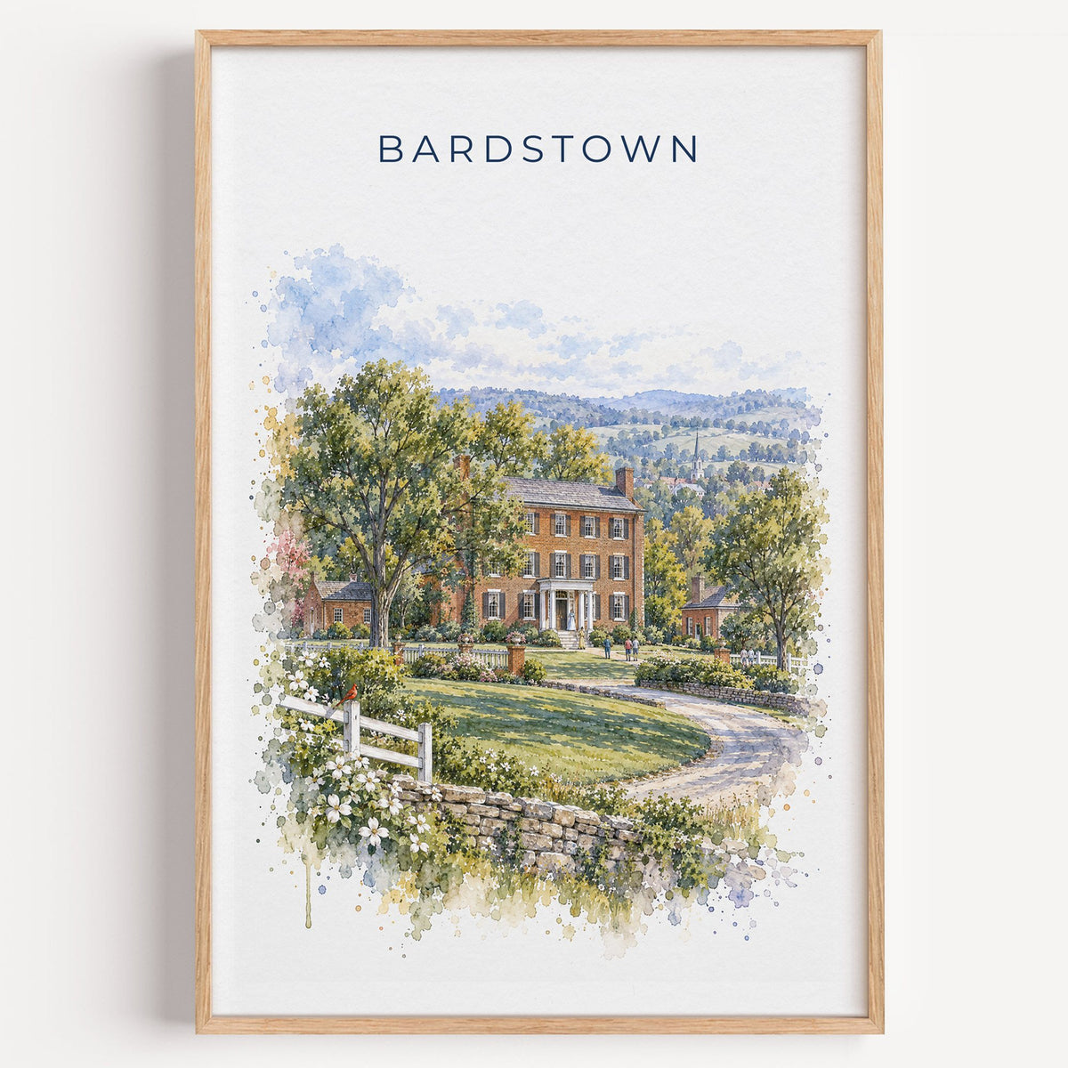 Bardstown, Kentucky watercolor print in a light oak frame on a plain white wall