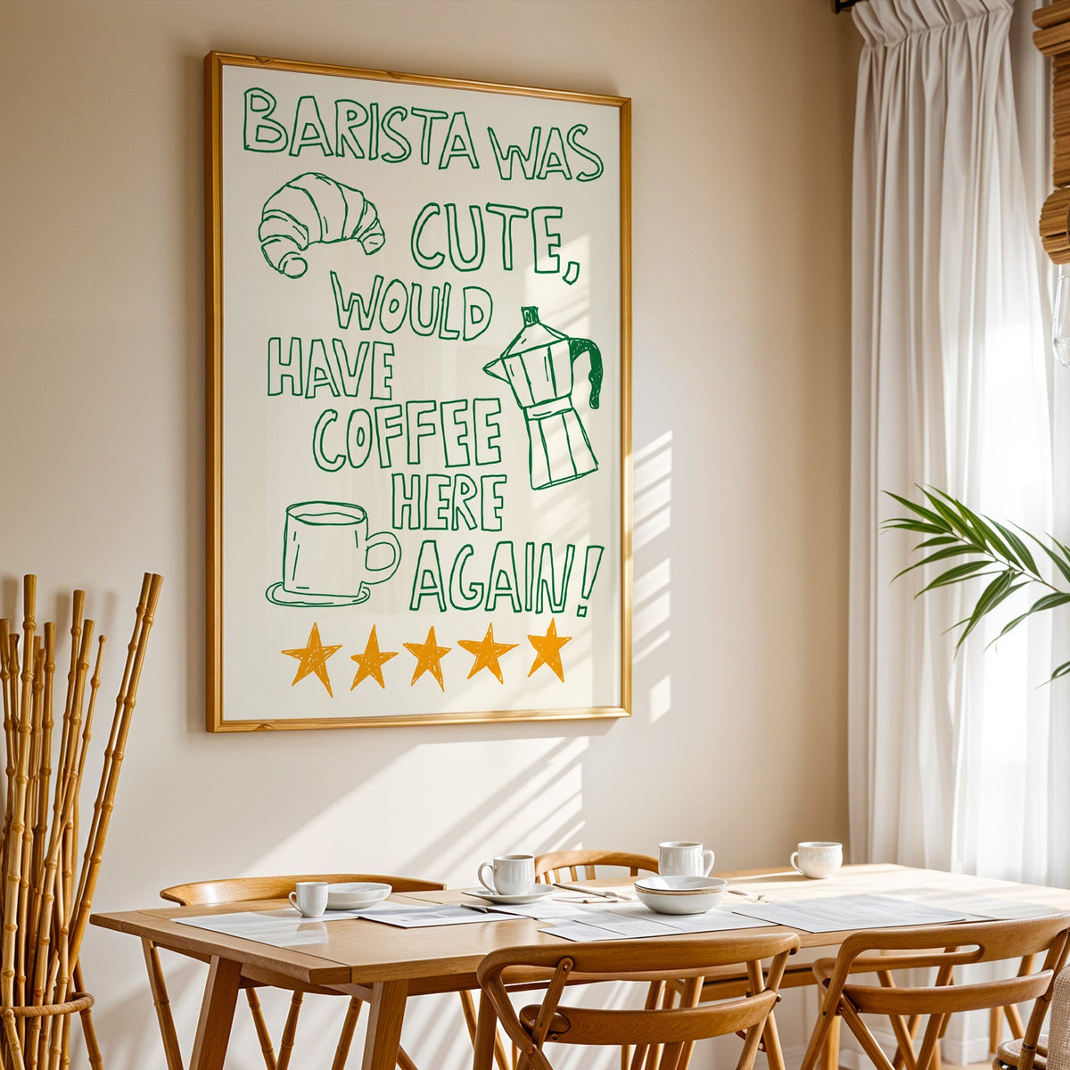 Green outline barista print in a gold frame above a sunlit breakfast table