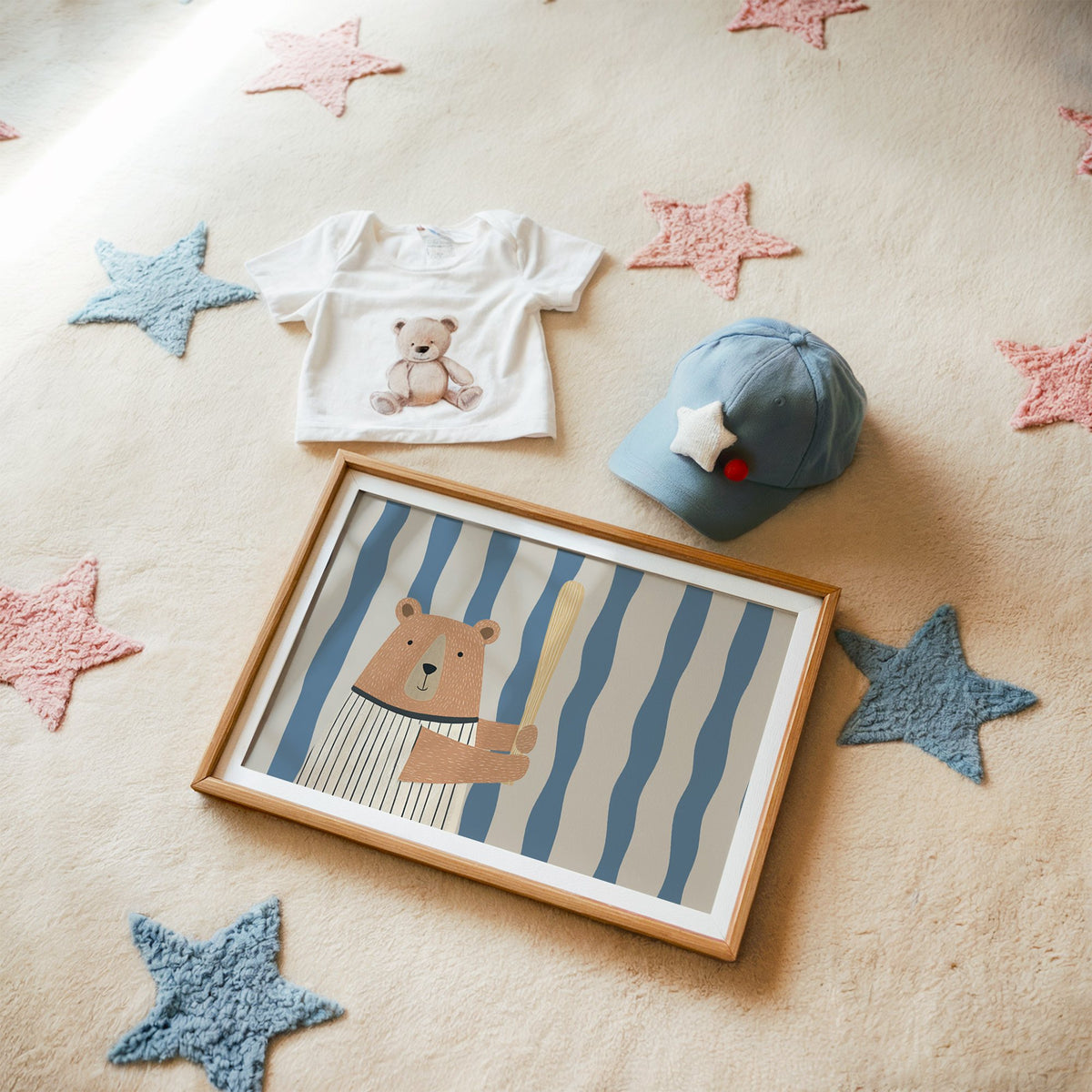 Landscape baseball bear blue stripe nursery print in a matted oak frame on a star rug with a baby tee