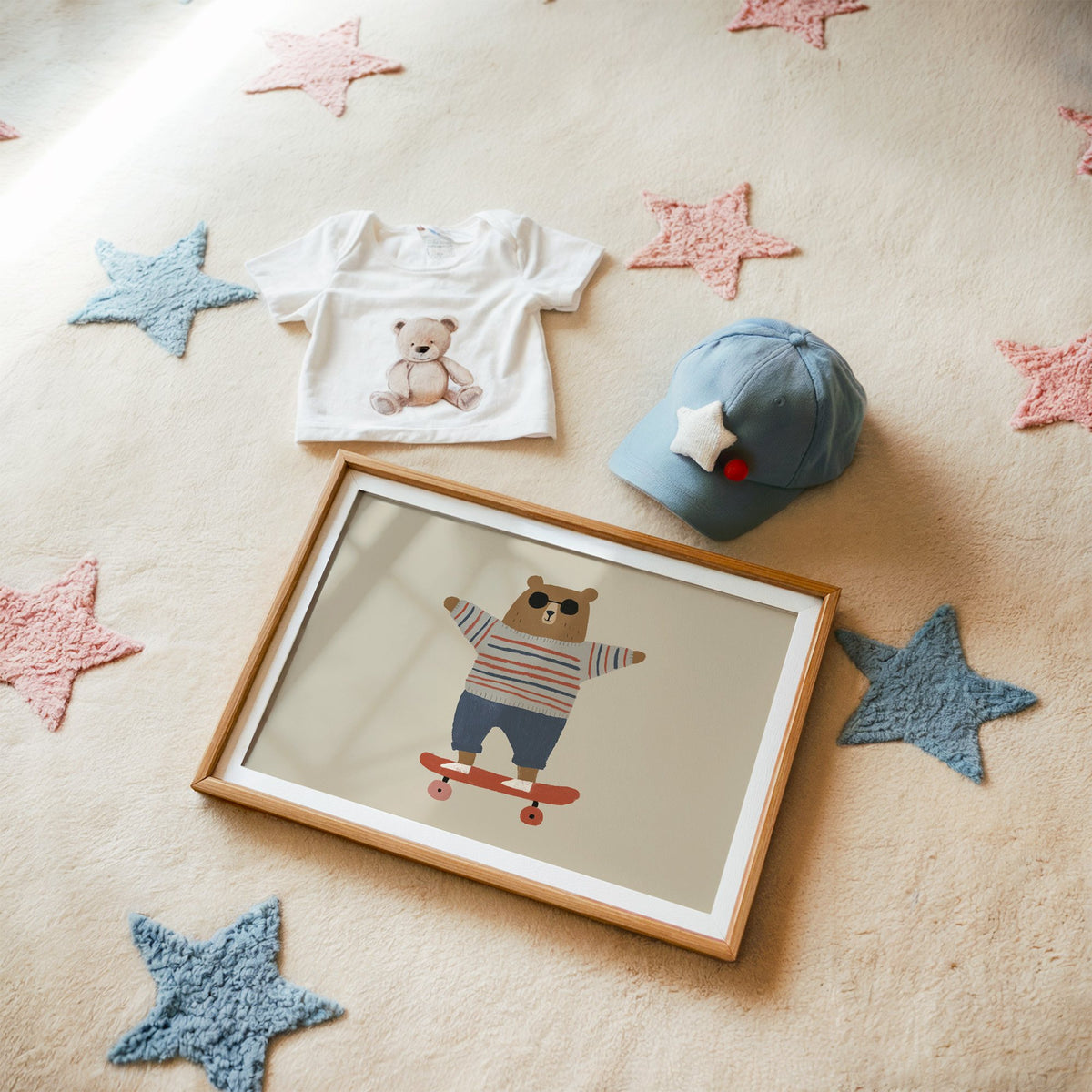 Landscape skateboard bear striped sweater nursery print in a matted oak frame on a star rug with a baby tee
