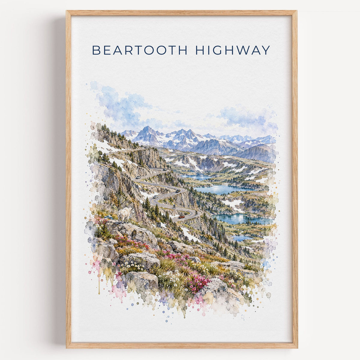 Beartooth Highway watercolor print in a light oak frame on a plain white wall