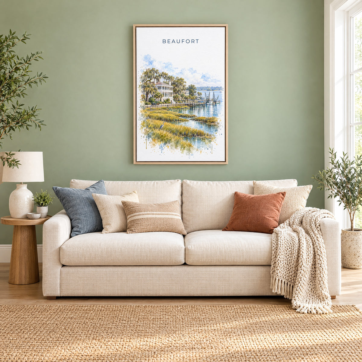 Beaufort, South Carolina watercolor print as a natural floater canvas above a cream linen sofa on a sage green wall