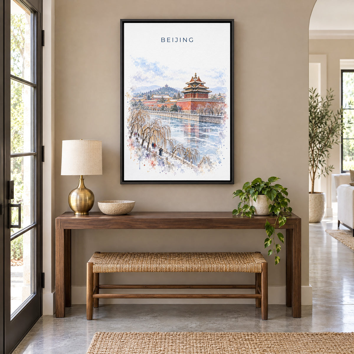 Beijing watercolor print as a black floater canvas above a walnut console and woven bench in an entryway