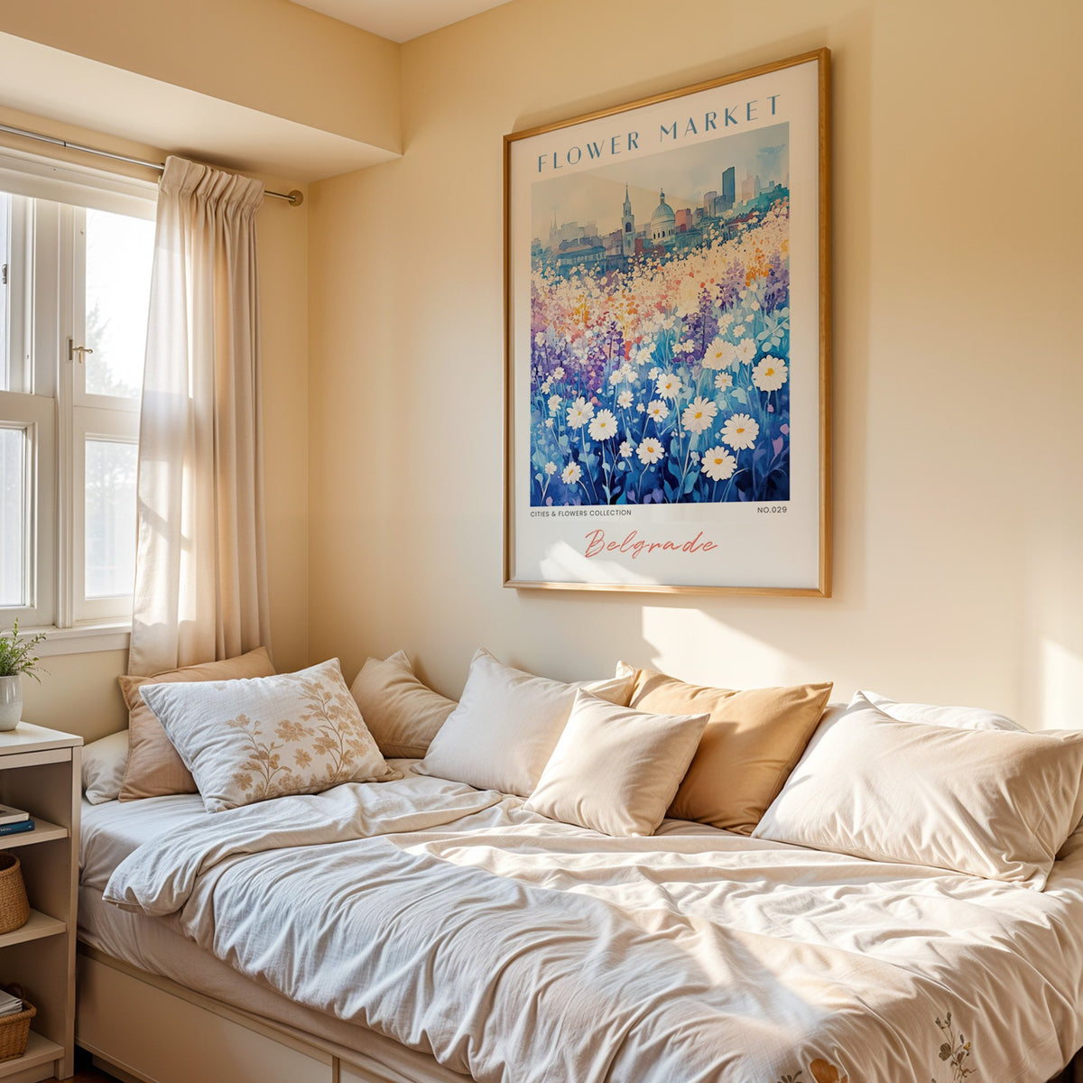 Belgrade flower market print in an oak frame above a cream daybed in a sunny bedroom