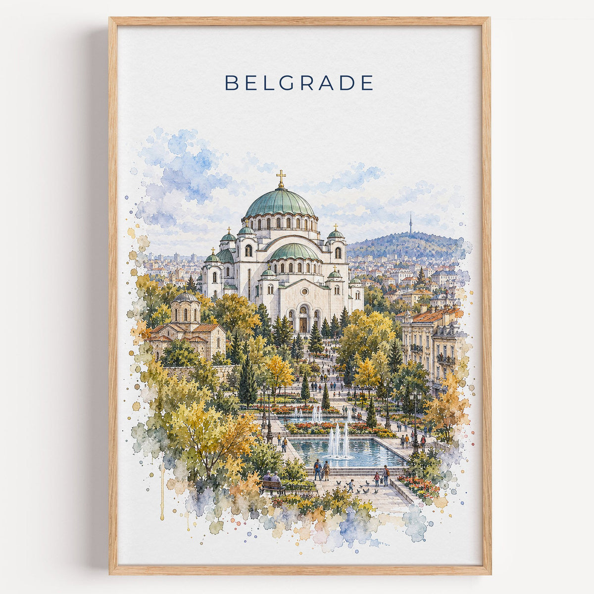 Belgrade watercolor print in a light oak frame on a plain white wall