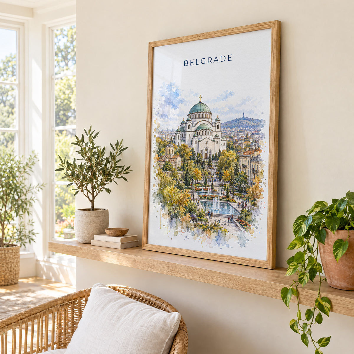 Belgrade watercolor print in an oak frame on a picture ledge in a sunlit sunroom