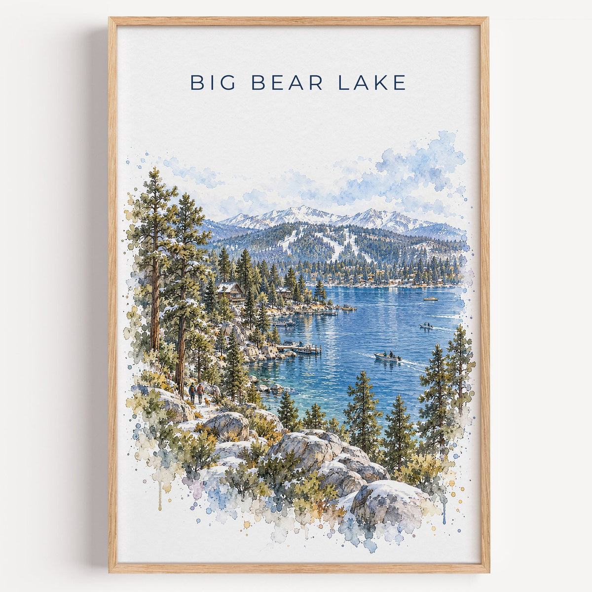 Big Bear Lake watercolor print in a light oak frame on a plain white wall