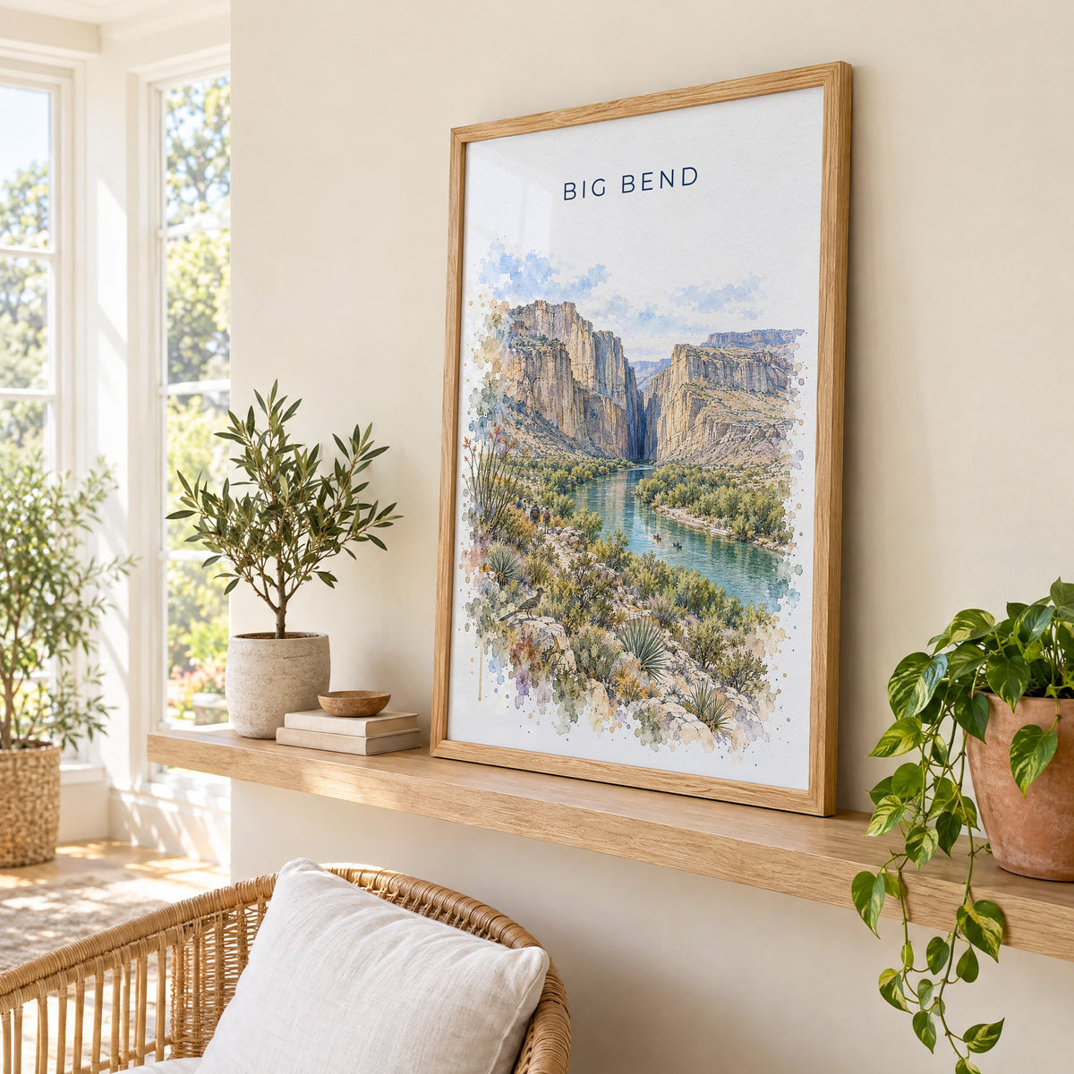 Big Bend National Park watercolor print in an oak frame on a picture ledge in a sunlit sunroom