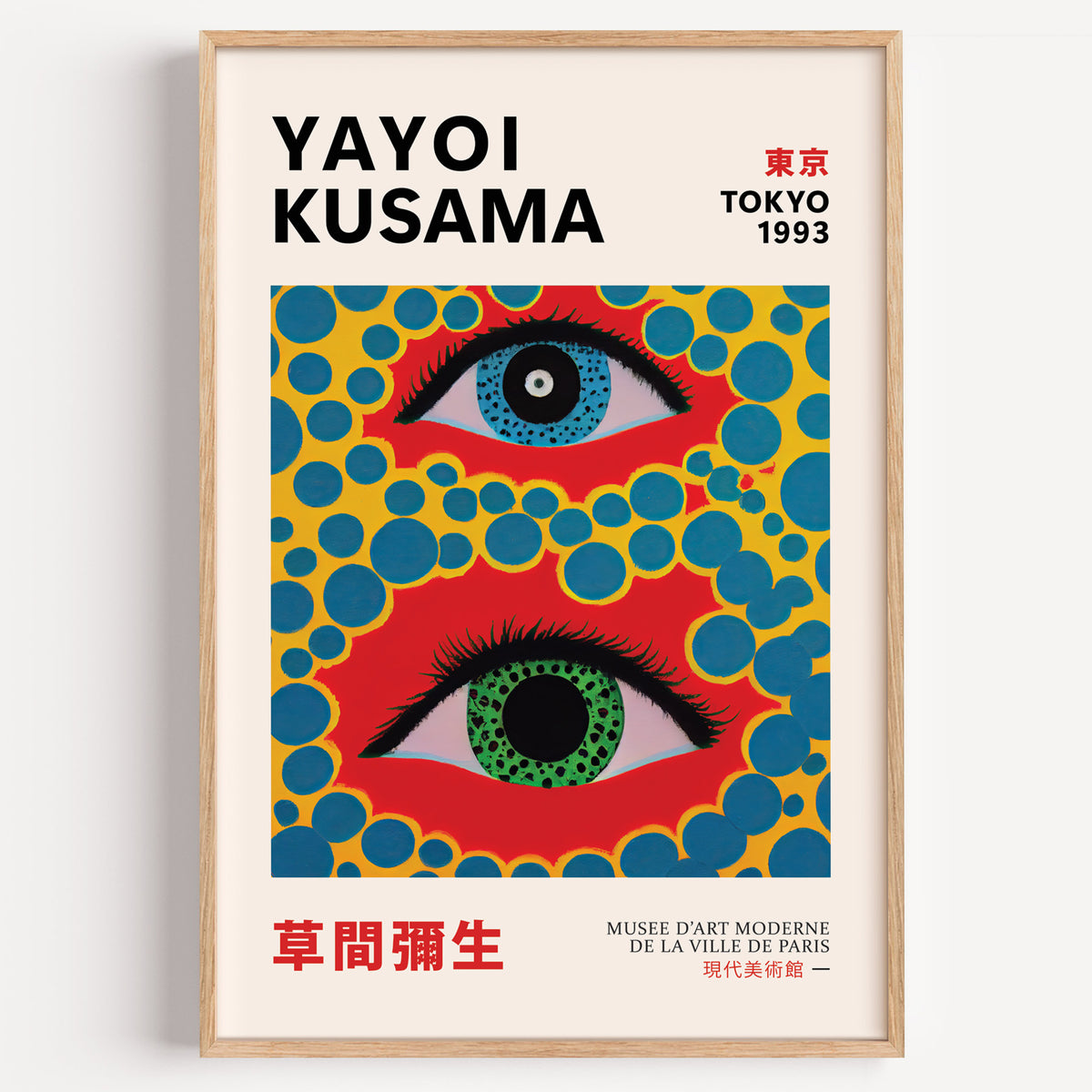 Yayoi Kusama inspired big eyes and blue dots print in a wood frame on a plain wall