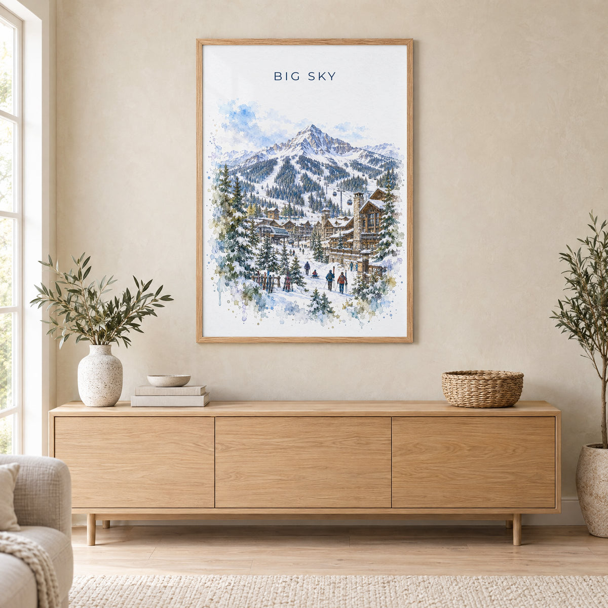 Big Sky watercolor print in an oak frame above a light wood sideboard in a Scandinavian living room