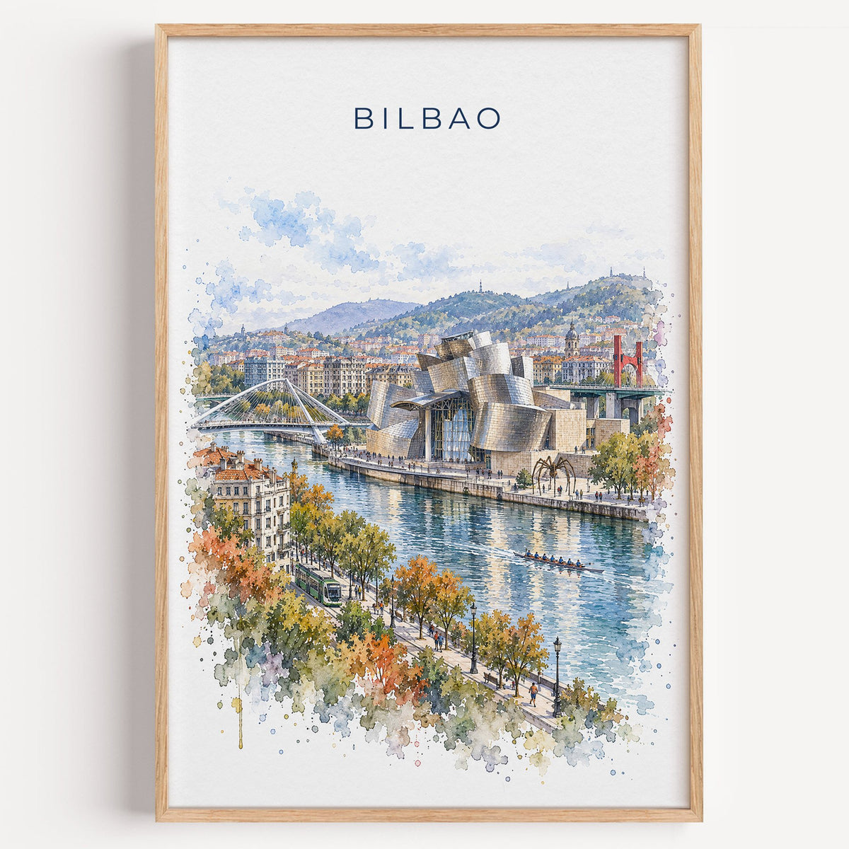 Bilbao watercolor print in a light oak frame on a plain white wall