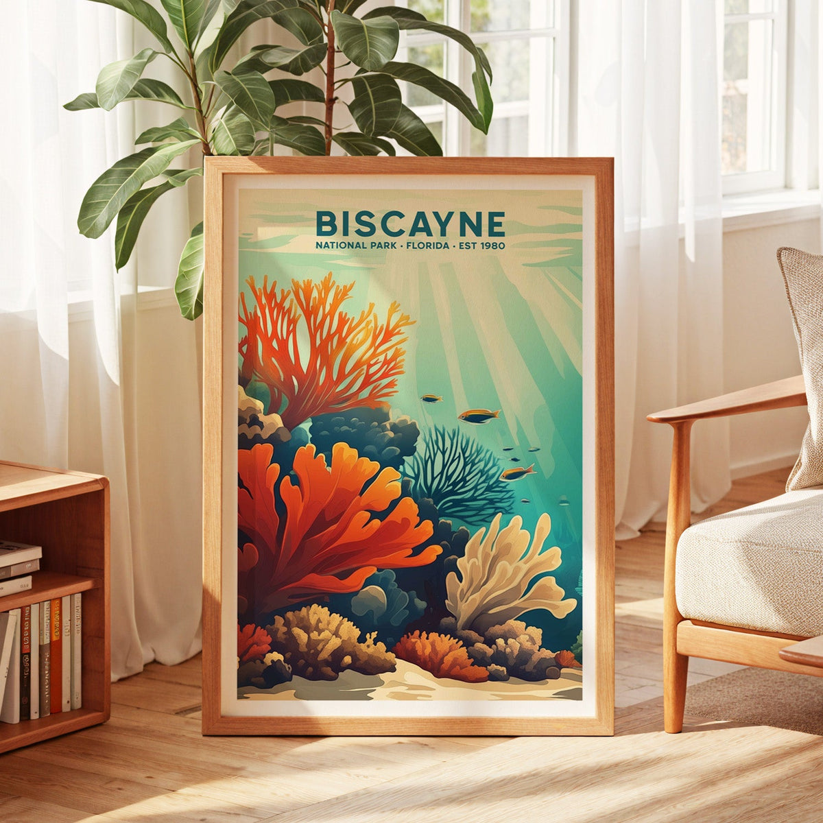 Biscayne National Park print in an oak frame by a sunlit window with sheer curtains and a fig plant