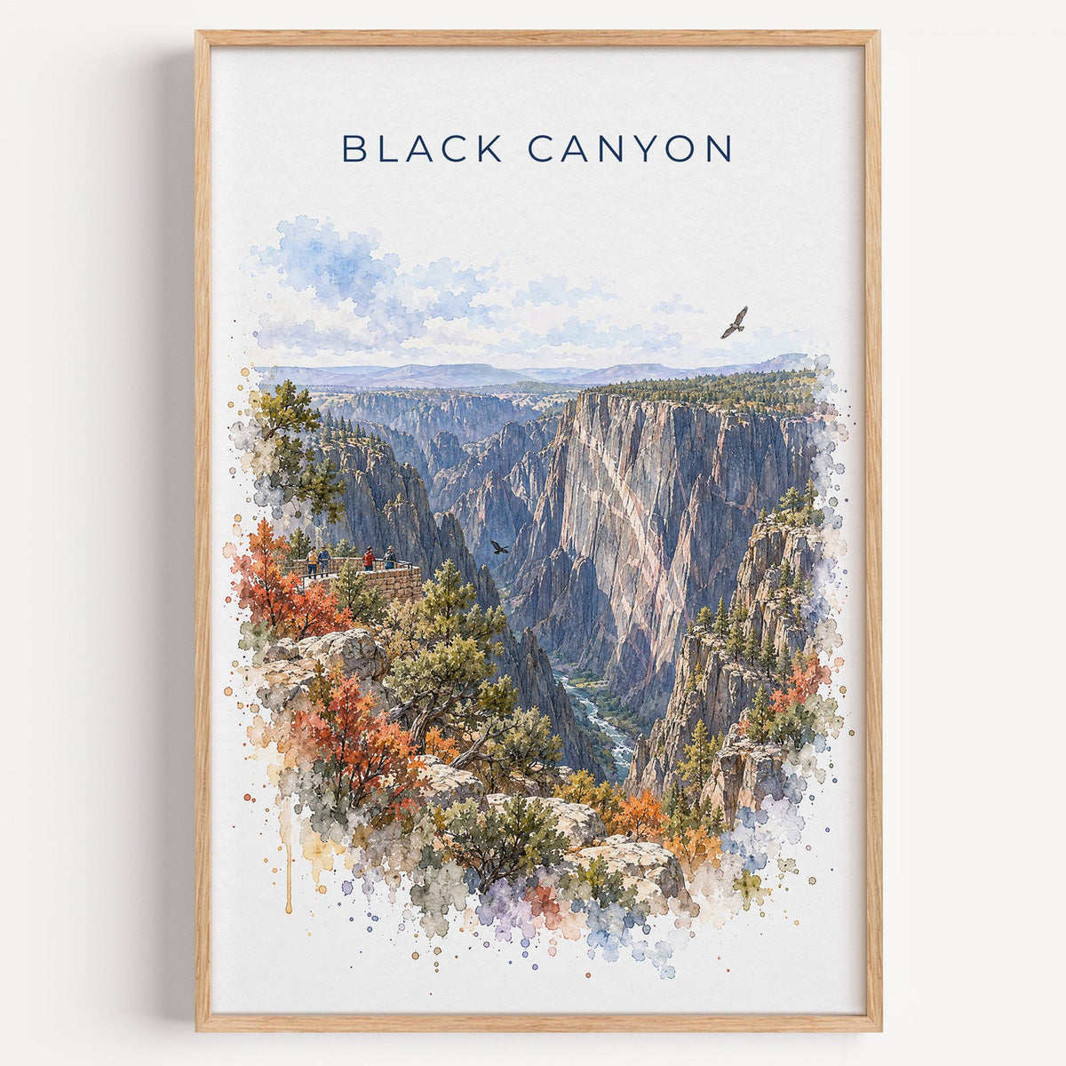 Black Canyon of the Gunnison National Park watercolor print in a light oak frame on a plain white wall