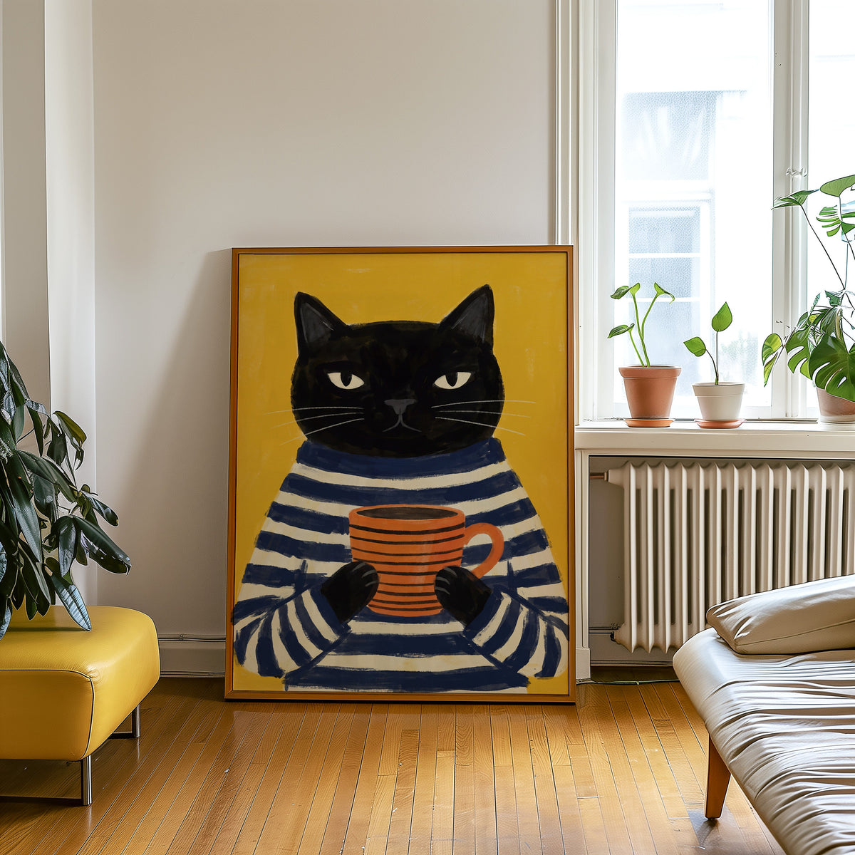 Breton stripe black cat print in an oak frame leaning beside a yellow leather bench