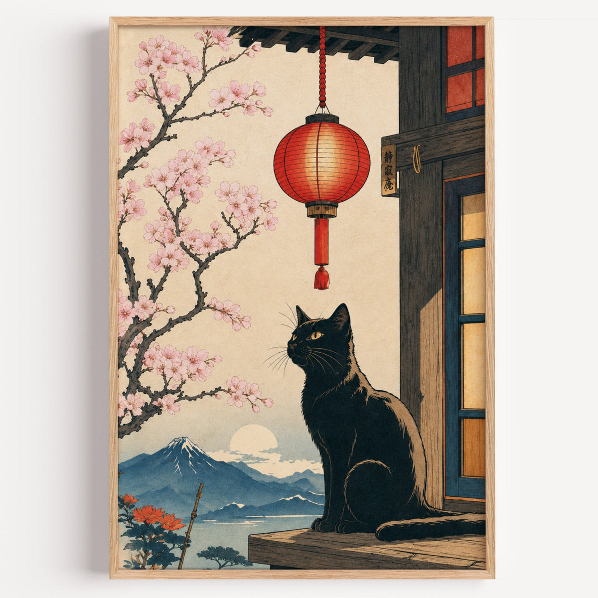 Black cat and red lantern poster in a light oak frame on a plain white wall