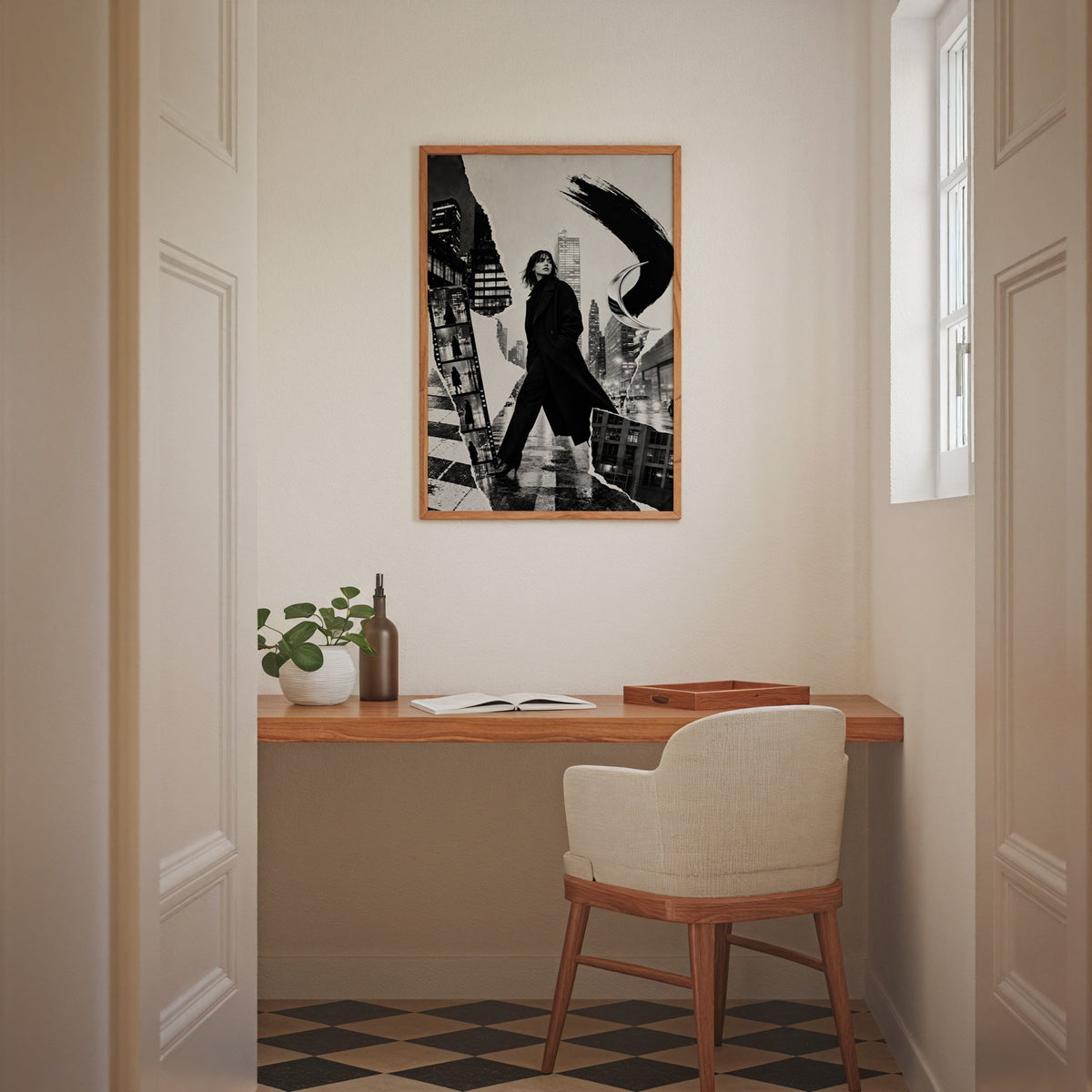 Woman in black coat torn paper collage print in an oak frame above a home office desk nook