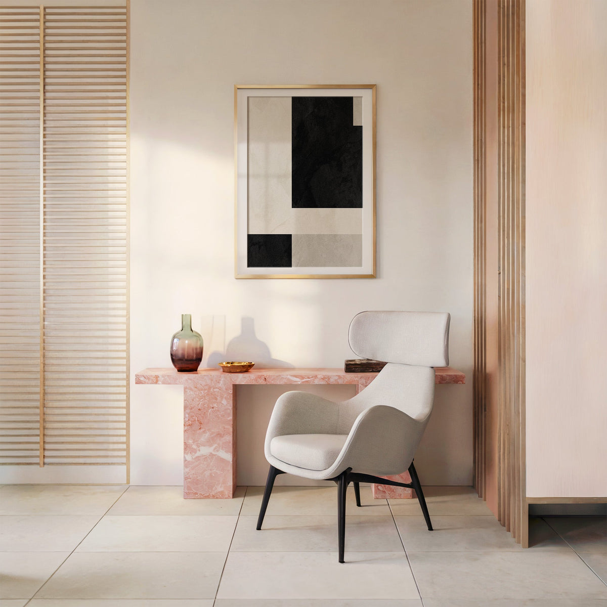 Black and cream offset plaster blocks print shown in a gold frame with a mat above a pink marble console and armchair