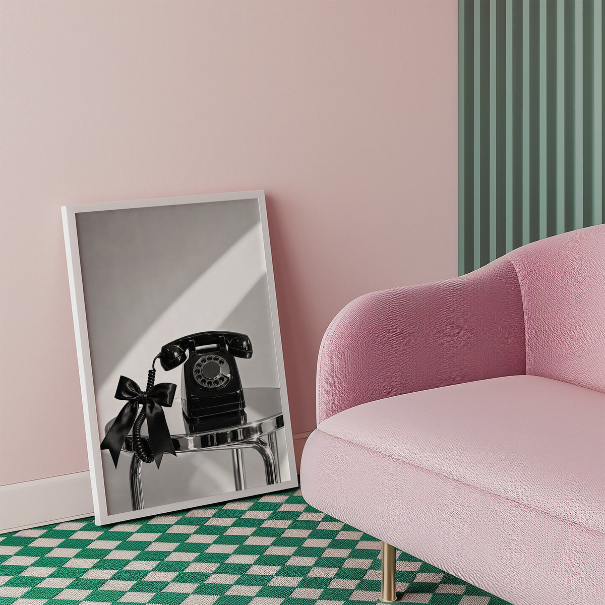 Black rotary phone with satin bow on chrome table print in a white frame beside a pink armchair on a checkered floor