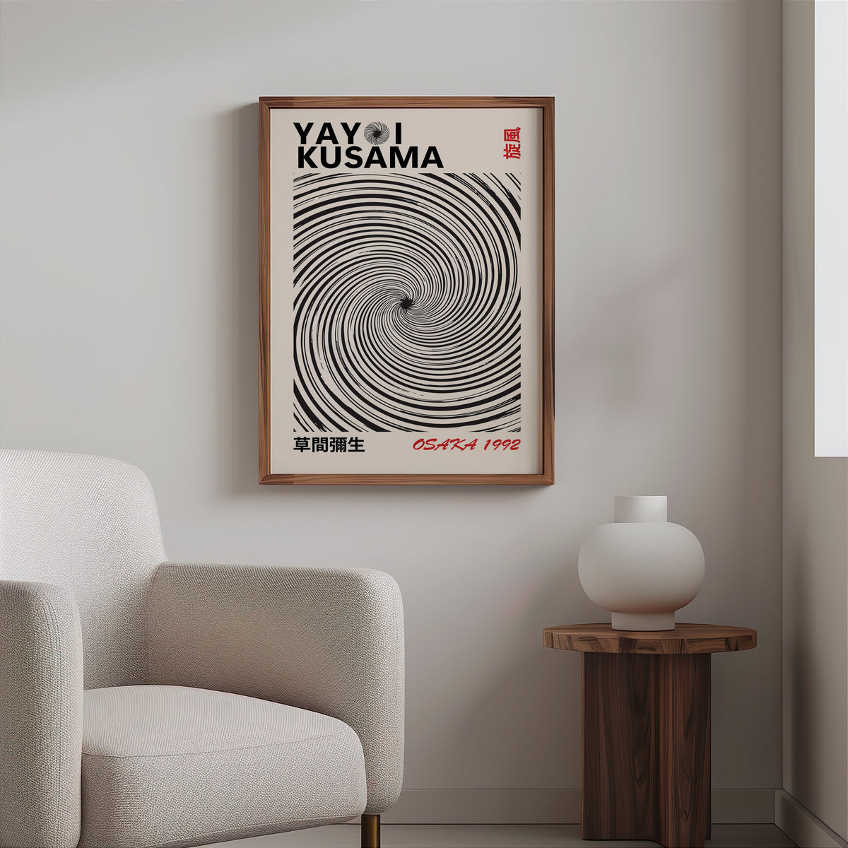 Yayoi Kusama inspired black spiral whirlwind print in a walnut frame above a boucle armchair