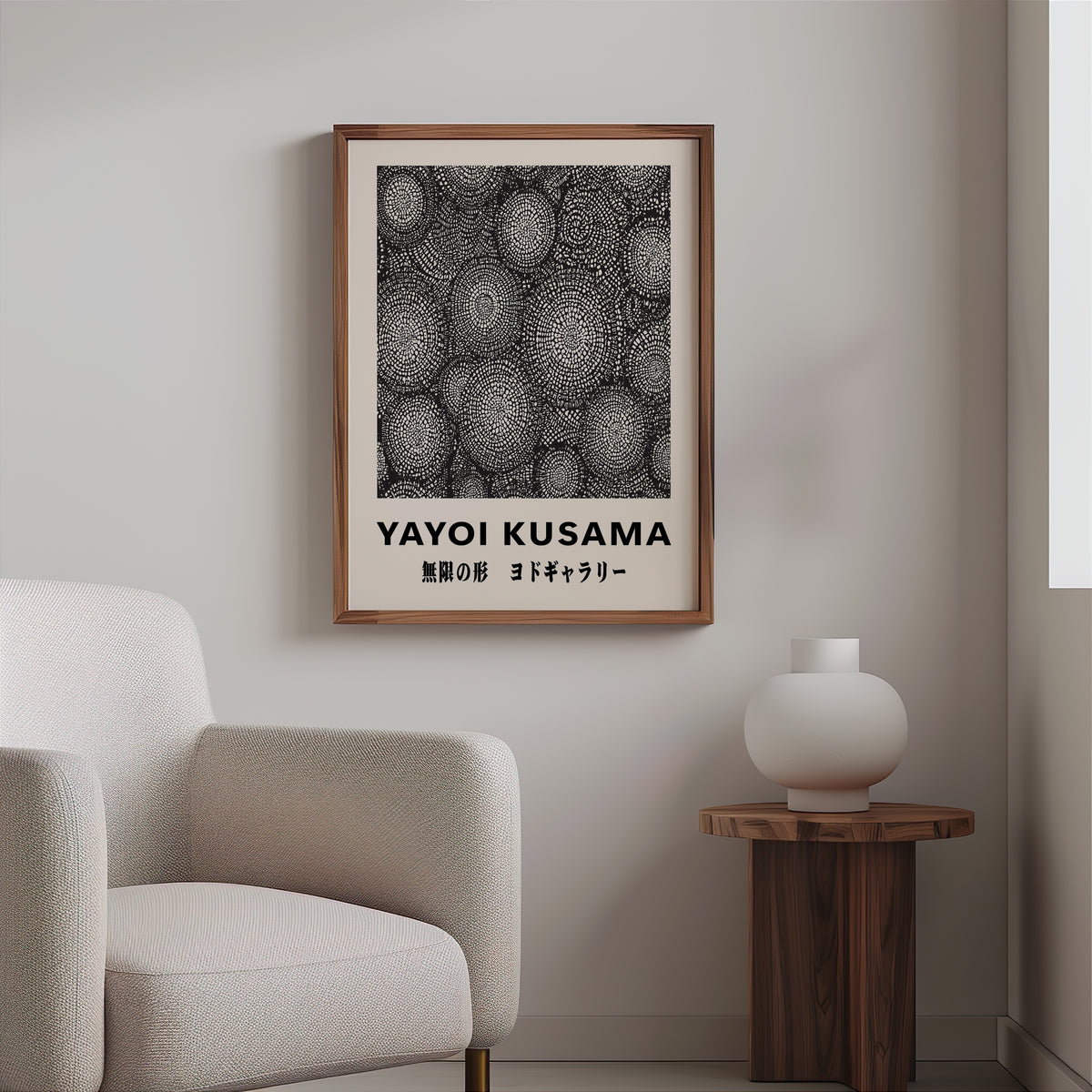 Yayoi Kusama inspired black and white oval net print above a cream boucle armchair