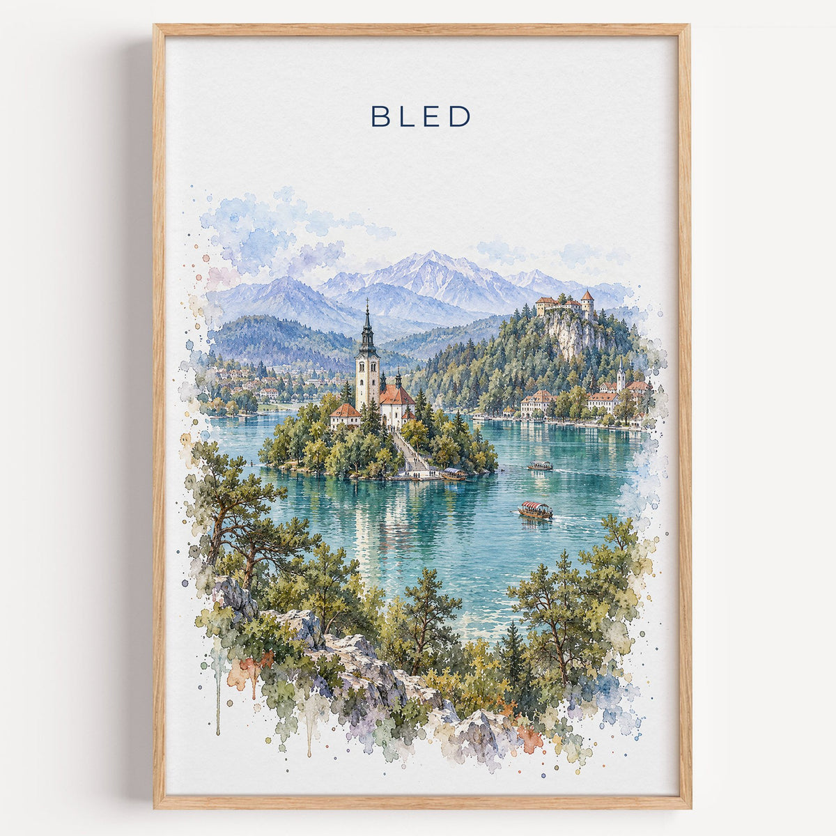 Bled watercolor print in a light oak frame on a plain white wall