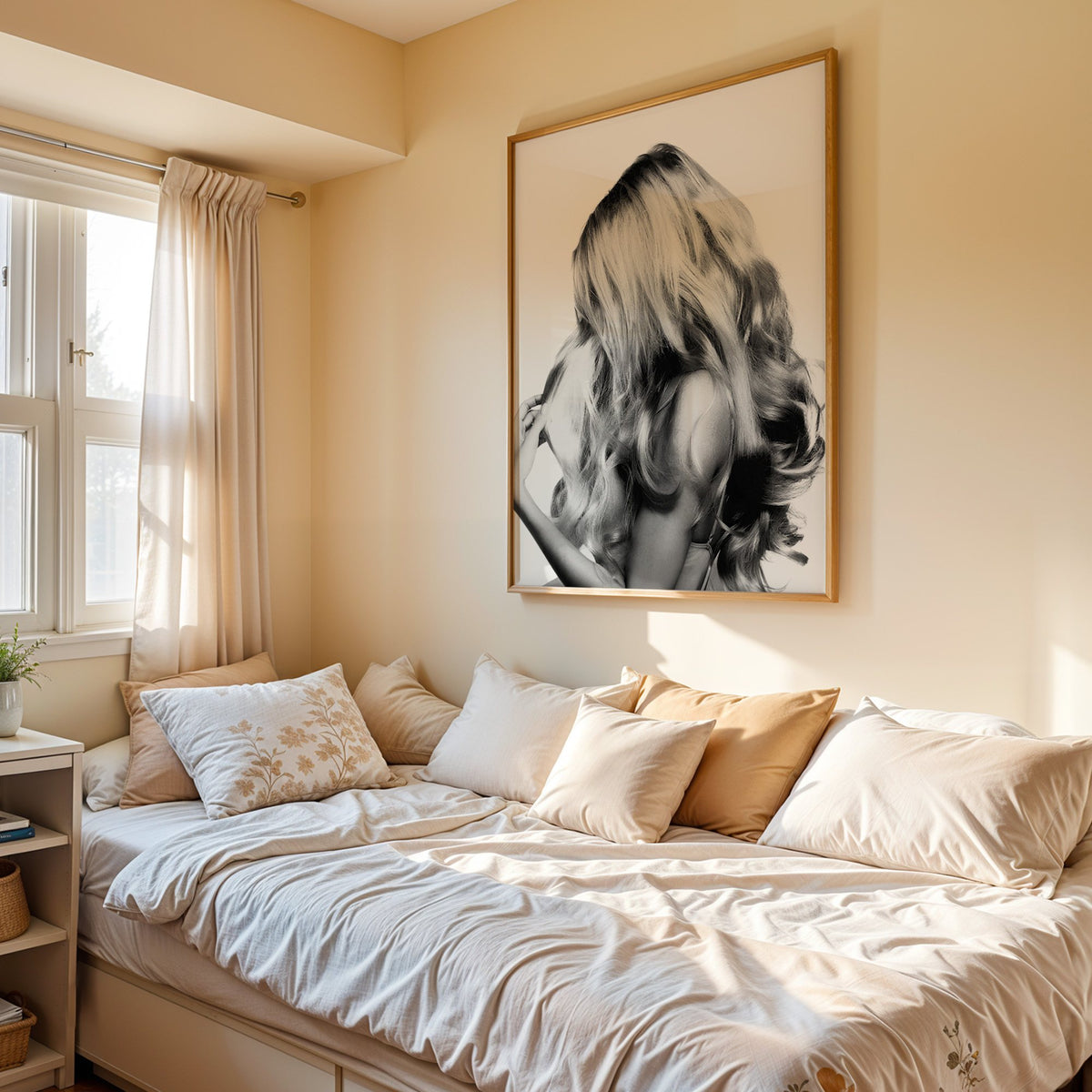 Long blonde wavy hair seen from behind print in an oak frame above a cream daybed in a sunny bedroom