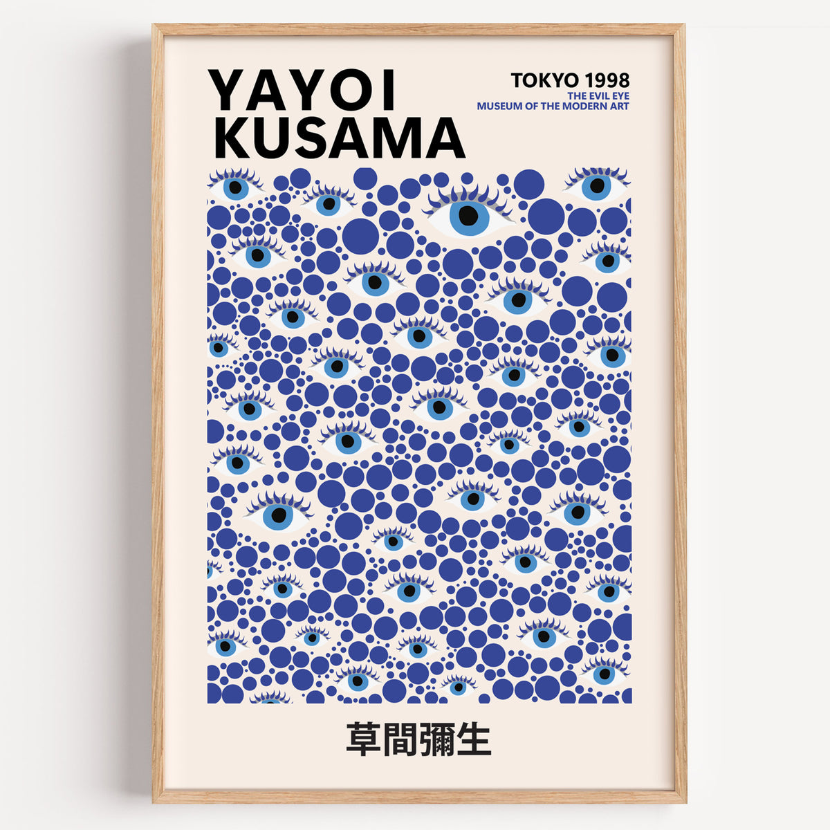 Yayoi Kusama inspired blue evil eye dot print in a wood frame on a plain wall