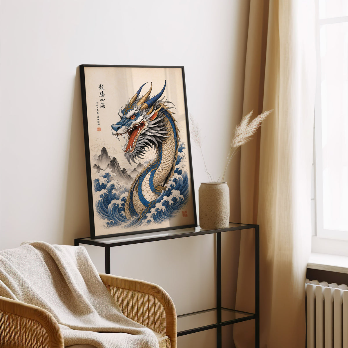 Blue dragon great waves poster in a black frame leaning on a glass console beside pampas grass