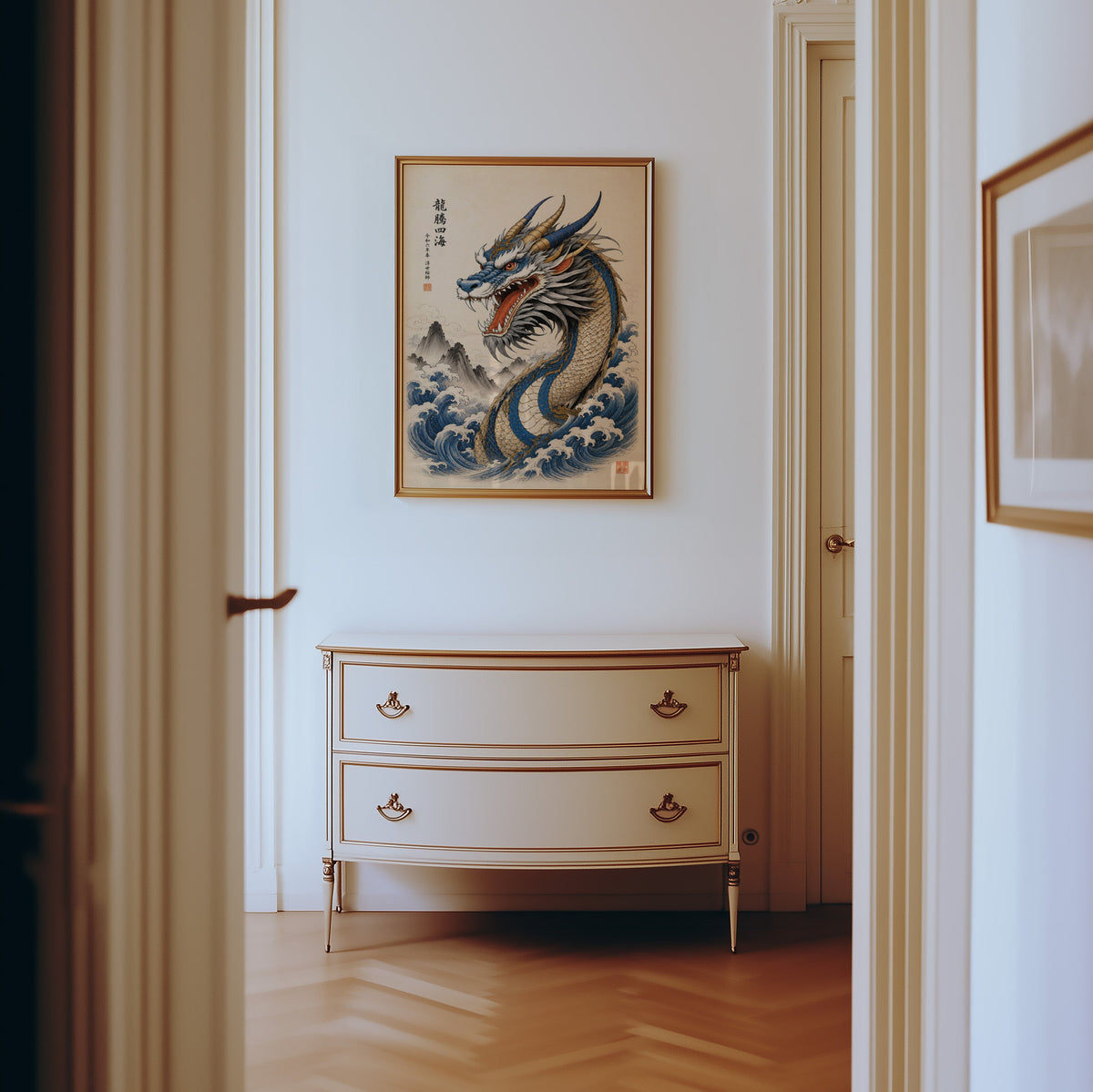 Blue dragon great waves poster shown in a gold frame in a hallway above a cream dresser